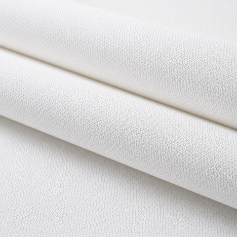 Rolled Deconix Dores white printable wallcovering showing its textured surface.