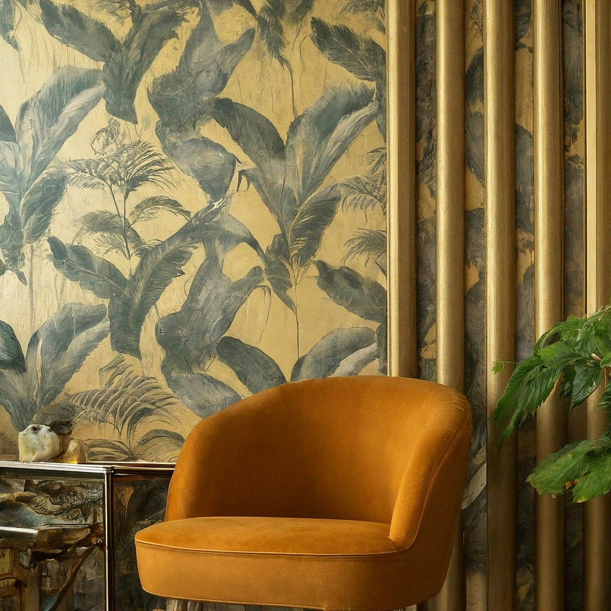 Bright gold metallic printable wallcovering illustrated with a leafy mural behind a mustard armchair.