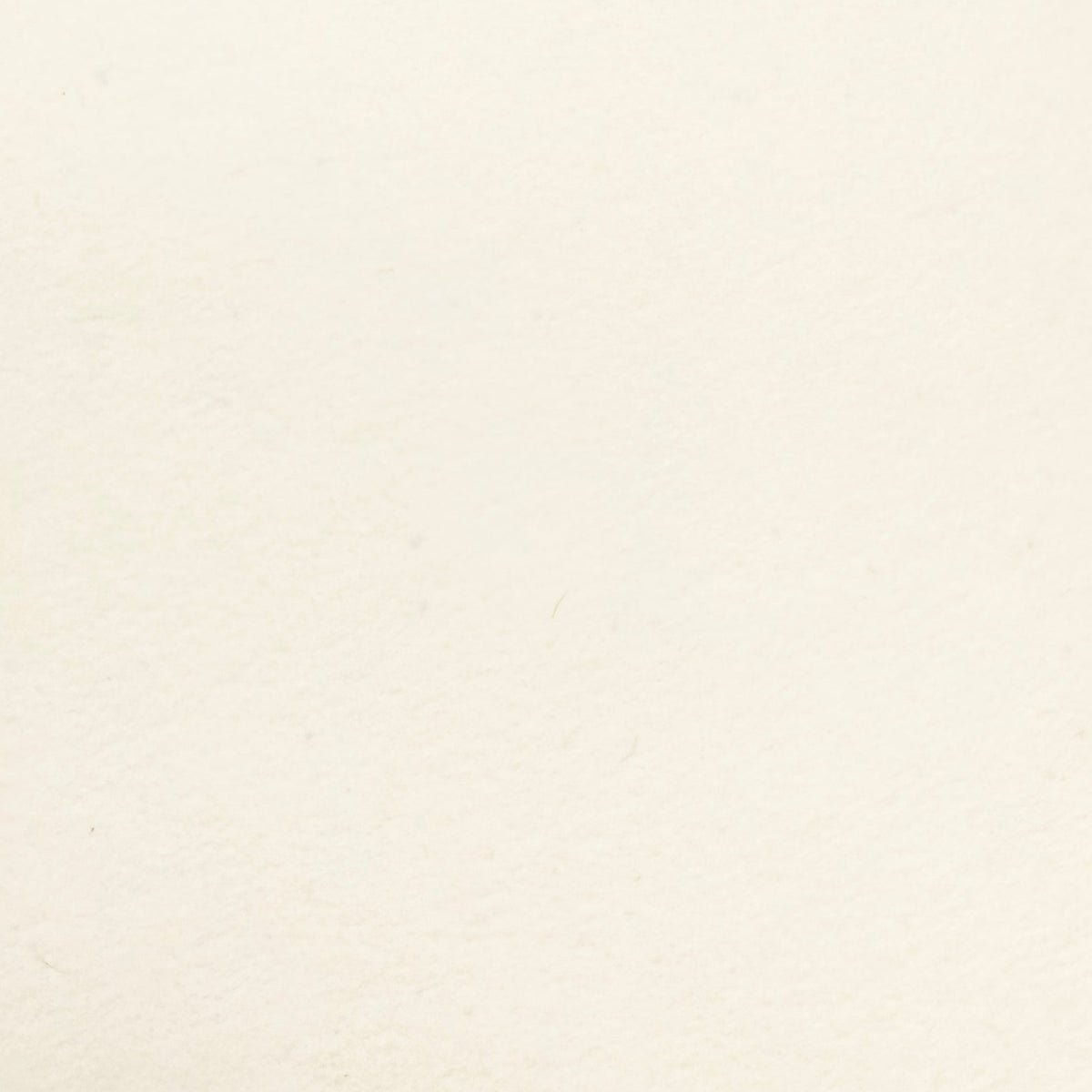 Close-up of the cream-coloured recycled printable wallcovering surface.